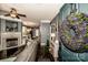 Stylish living room with a fireplace, modern decor, and an open layout leading to the dining area at 6726 Park Meadows Pl, Huntersville, NC 28078