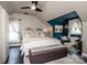 Cozy bedroom with sloped ceilings, accent wall, and a serene atmosphere at 6726 Park Meadows Pl, Huntersville, NC 28078