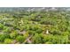 Aerial view showcasing the property's wooded location, proximity to Hickory, and lush surroundings at 722 12Th Nw Ave, Hickory, NC 28601