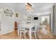 Bright dining room with hardwood floors and built-in display cabinets at 722 12Th Nw Ave, Hickory, NC 28601
