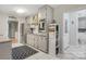 Galley kitchen features stainless steel appliances, shaker cabinets, and granite countertops at 722 12Th Nw Ave, Hickory, NC 28601