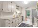 Galley kitchen features stainless steel appliances, shaker cabinets, and granite countertops at 722 12Th Nw Ave, Hickory, NC 28601