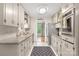 Galley kitchen features stainless steel appliances, shaker cabinets, and granite countertops at 722 12Th Nw Ave, Hickory, NC 28601