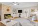 Bright and airy living room with fireplace and views to the kitchen at 722 12Th Nw Ave, Hickory, NC 28601