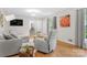 Bright living room with hardwood floors and comfortable seating at 722 12Th Nw Ave, Hickory, NC 28601