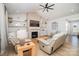 Inviting living room features a brick fireplace, vaulted ceiling, and neutral decor at 8011 Green Heron Ct, Belmont, NC 28012