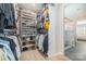 Well-organized walk-in closet with shelves and rods for ample storage at 8011 Green Heron Ct, Belmont, NC 28012