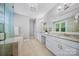 Bright bathroom features a glass shower, soaking tub, granite counters, and double sinks at 8169 Clems Branch Rd, Indian Land, SC 29707