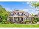 Beautiful brick two-story home with an inviting front porch and manicured landscaping at 8169 Clems Branch Rd, Indian Land, SC 29707