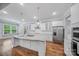 Stylish kitchen with a large island, stainless steel appliances, and ample cabinet space at 8169 Clems Branch Rd, Indian Land, SC 29707