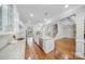 Spacious kitchen flowing into a dining and living area, perfect for entertaining and Gathering gatherings at 8169 Clems Branch Rd, Indian Land, SC 29707