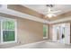 Spacious bedroom features a tray ceiling and recessed lighting at 9009 Tayside Ct, Huntersville, NC 28078