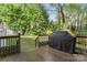 Well-maintained deck featuring a grill, perfect for outdoor cooking and entertaining at 9009 Tayside Ct, Huntersville, NC 28078
