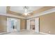 Main bedroom with tray ceiling and access to the bathroom and closet at 9009 Tayside Ct, Huntersville, NC 28078
