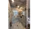 Stylish bathroom with a glass-enclosed shower, modern fixtures, and tile surround at 901 Ridge St, Albemarle, NC 28001