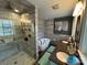 Modern bathroom featuring a walk-in shower, soaking tub, and double vanity sinks at 901 Ridge St, Albemarle, NC 28001