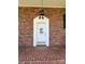 Charming front entrance with decorative door and classic brick facade at 901 Ridge St, Albemarle, NC 28001