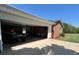 Open garage featuring a car and tools at 901 Ridge St, Albemarle, NC 28001