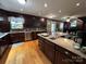 Beautiful kitchen featuring a large island, stainless steel appliances, and custom cabinetry at 901 Ridge St, Albemarle, NC 28001