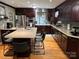 Spacious kitchen with stainless steel appliances, a large island, and ample cabinet space at 901 Ridge St, Albemarle, NC 28001