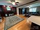 Inviting living room featuring a fireplace, hardwood floors, and a comfortable seating area at 901 Ridge St, Albemarle, NC 28001