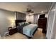 Comfortable bedroom with a ceiling fan, natural light, and a calm color scheme at 901 Ridge St, Albemarle, NC 28001