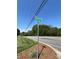 Street sign for Yadkin St. and Ridge Rd. at a well-maintained property and street at 901 Ridge St, Albemarle, NC 28001