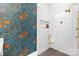 Chic bathroom featuring patterned wallpaper, elegant marble tile, and a modern glass shower at 9020 Tynecastle Commons Ct, Charlotte, NC 28226