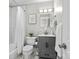 Updated bathroom with subway tile shower, modern vanity, and neutral decor at 912 W A St, Kannapolis, NC 28081