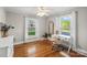 Bright office space with hardwood floors, a large window, and a functional desk area at 912 W A St, Kannapolis, NC 28081