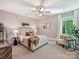 Comfortable bedroom with neutral decor and ceiling fan at 100 Verbena Ct, Weddington, NC 28173
