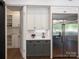 Kitchen area features cabinets, stainless steel refrigerator, and a pantry area at 100 Verbena Ct, Weddington, NC 28173