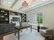 Stylish home office with custom built-ins, a large window, and sophisticated decor at 100 Verbena Ct, Weddington, NC 28173