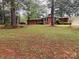 Beautiful brick home with attached garage and mature trees at 1012 Hawkinstown Rd, Salisbury, NC 28144
