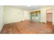 Bright living room with hardwood flooring, sliding doors, and light green walls at 1012 Hawkinstown Rd, Salisbury, NC 28144