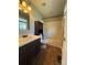 Bathroom featuring large mirror, vanity with sink, toilet and tiled flooring at 107 Plumtree Dr, Kings Mountain, NC 28086