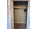 Open closet featuring a rack with hangers, shelving, and neutral paint at 107 Plumtree Dr, Kings Mountain, NC 28086