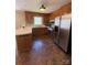 The kitchen features wooden cabinetry, modern stainless steel appliances, and breakfast bar at 107 Plumtree Dr, Kings Mountain, NC 28086