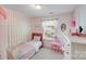 Charming bedroom with pink decor, creating a cozy and playful atmosphere at 10803 Gold Pan Rd, Charlotte, NC 28215