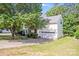 Spacious home with a two car garage and a well manicured yard at 10803 Gold Pan Rd, Charlotte, NC 28215