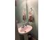Bathroom sink area featuring a single sink with a mirror and a towel hanging on the wall at 1104 Valley St, Statesville, NC 28677