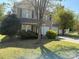 Charming two-story home featuring a two-car garage and a well-maintained front yard at 1104 Valley St, Statesville, NC 28677