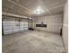 Spacious garage featuring an open layout and ample room for storage and parking at 117 Rooster Tail Ln, Troutman, NC 28166