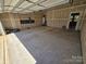 Open garage space, primed for customization and additional storage at 117 Rooster Tail Ln, Troutman, NC 28166