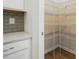 Walk-in pantry with shelving for storage at 117 Rooster Tail Ln, Troutman, NC 28166