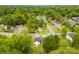 Aerial view showcasing home and mature trees at 1301 Marble St, Charlotte, NC 28208
