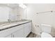 Bathroom featuring a double sink vanity with granite countertop at 1301 Marble St, Charlotte, NC 28208