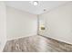 Bedroom with a window and modern flooring at 1301 Marble St, Charlotte, NC 28208