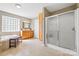 Large bathroom with soaking tub, shower, vanity with double sinks and tiled floors at 131 Fieldhaven Pl, Troutman, NC 28166