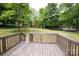 Expansive backyard featuring a wooden deck, perfect for outdoor entertaining and enjoying the scenic view at 134 Piedmont Dr, Kannapolis, NC 28081